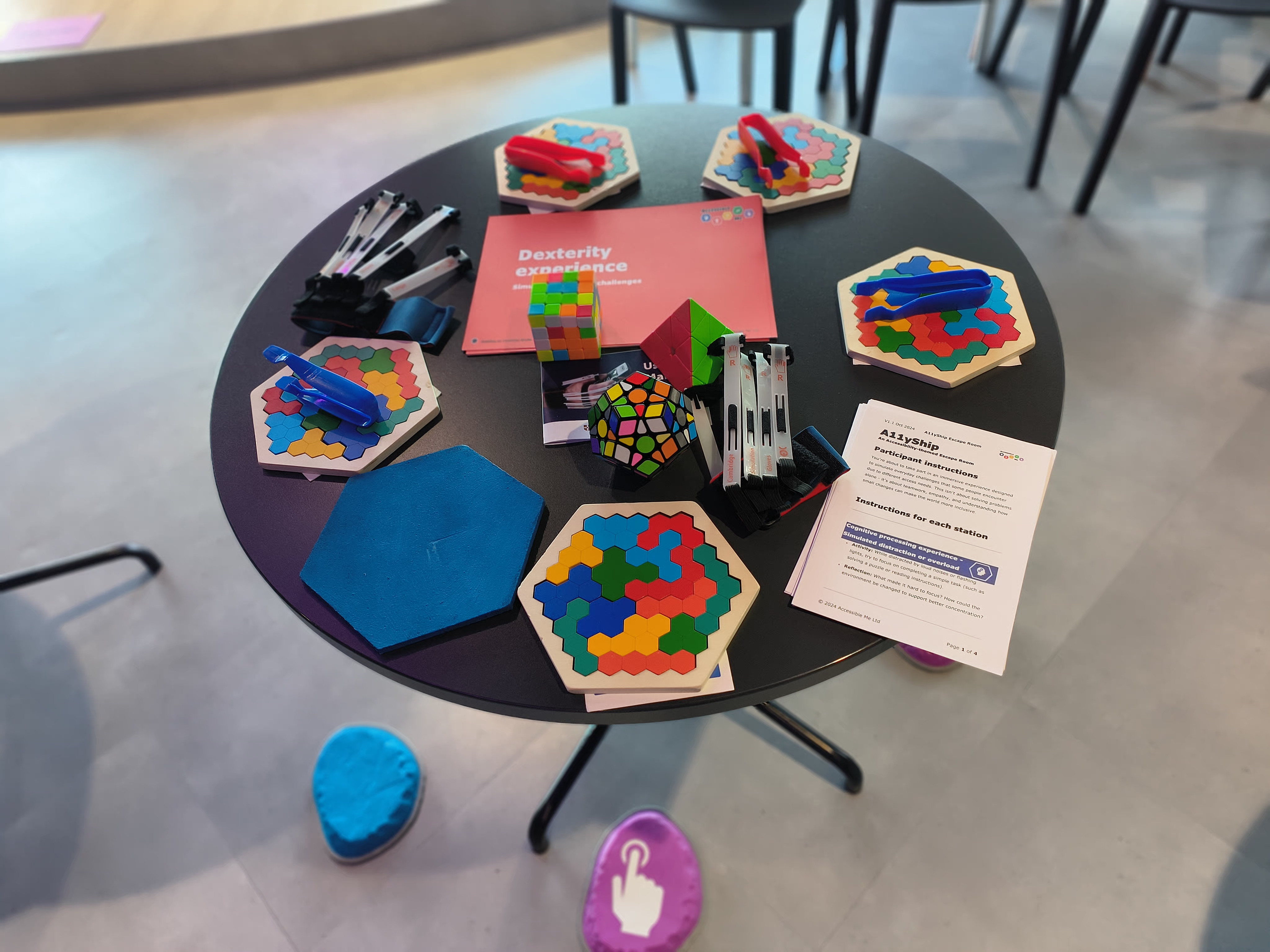 A table with different puzzles simulating limited dexterity challenges