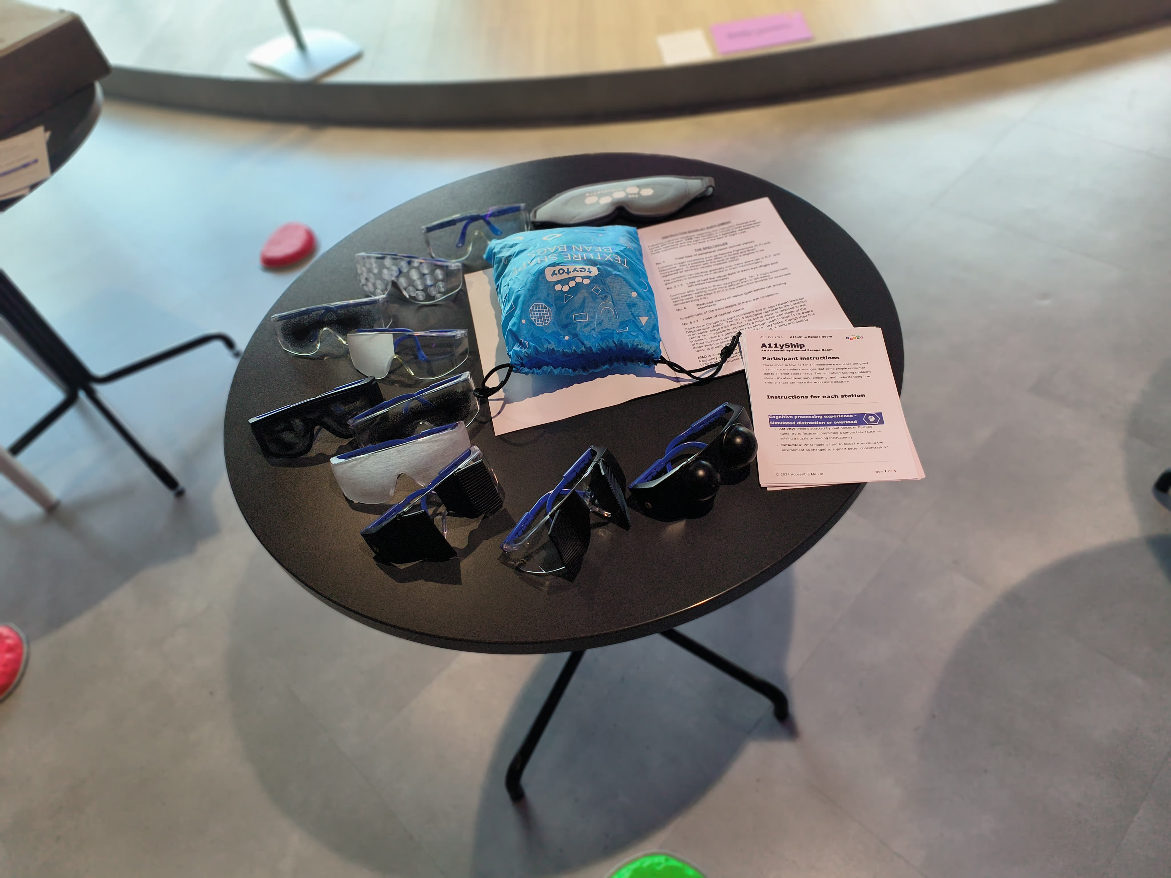 Reduce vision simulating glasses arranged on a table.